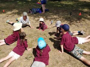 Diana Mello leads a kids yoga class.